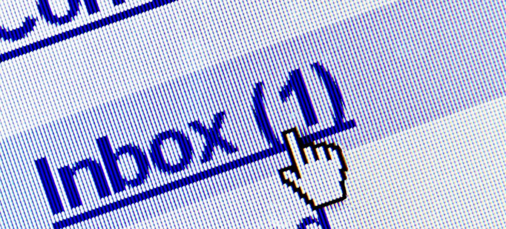 A macro photo of a cursor clicking a link to their Inbox