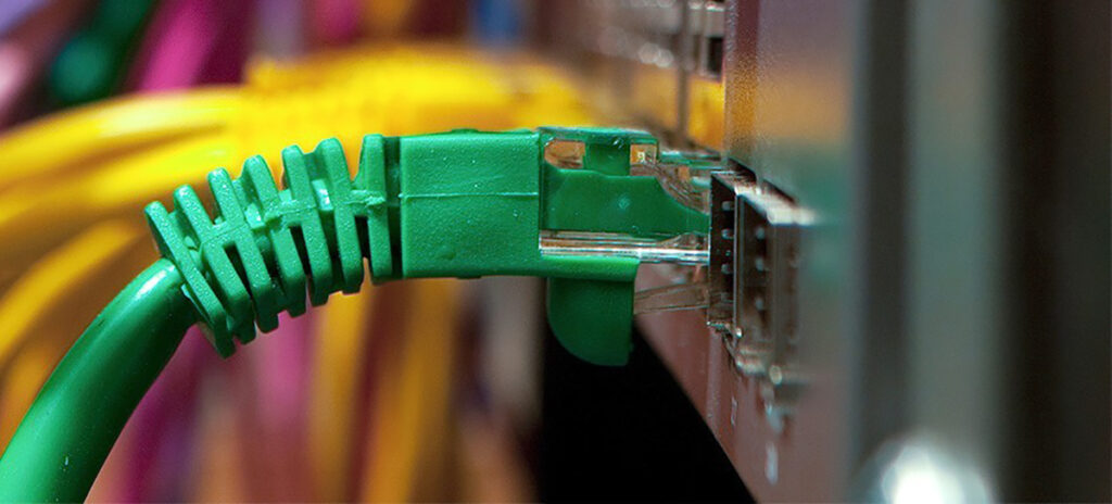 Colorful ethernet cables connected to a computer