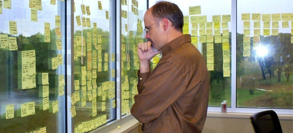 David Poteet pondering sticky notes used in a content strategy session