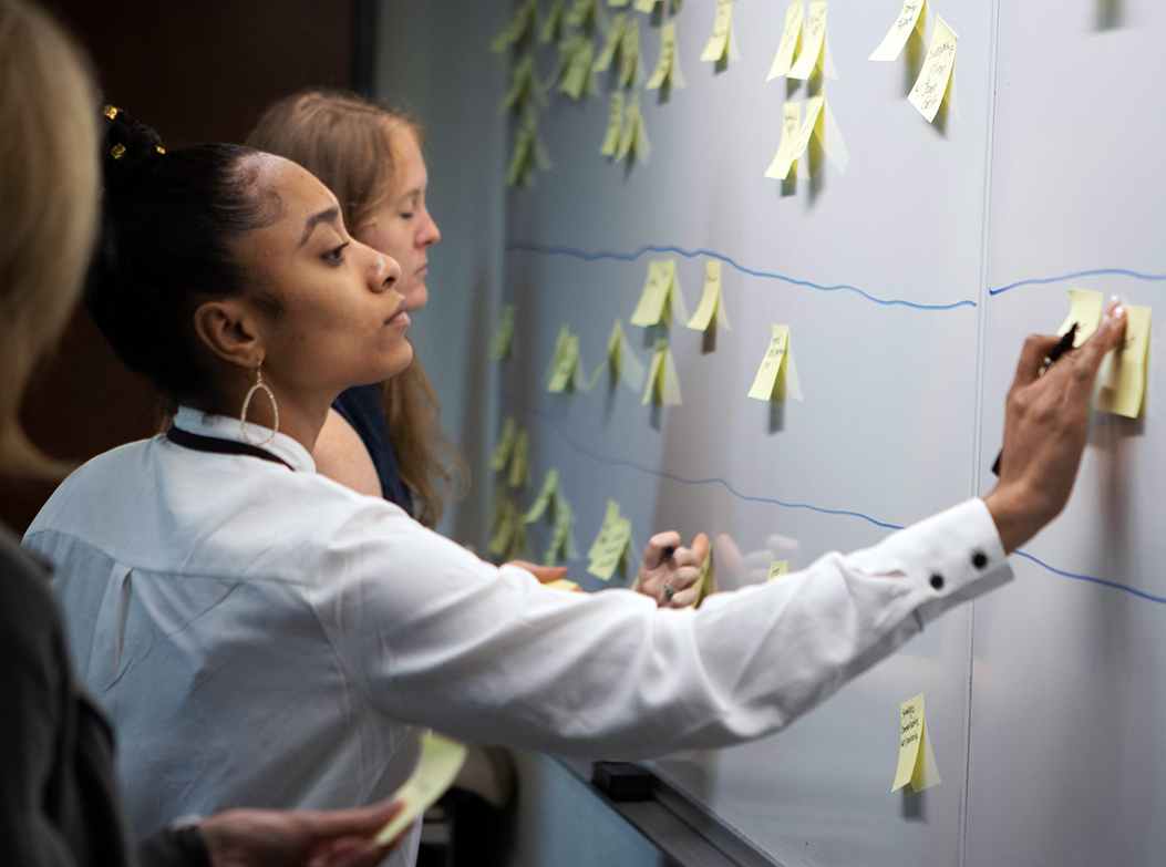 Women participating in a content strategy exercise