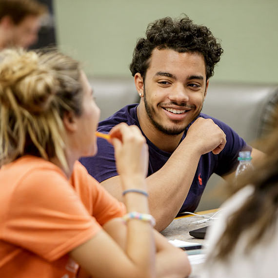 Two OSU students studying together