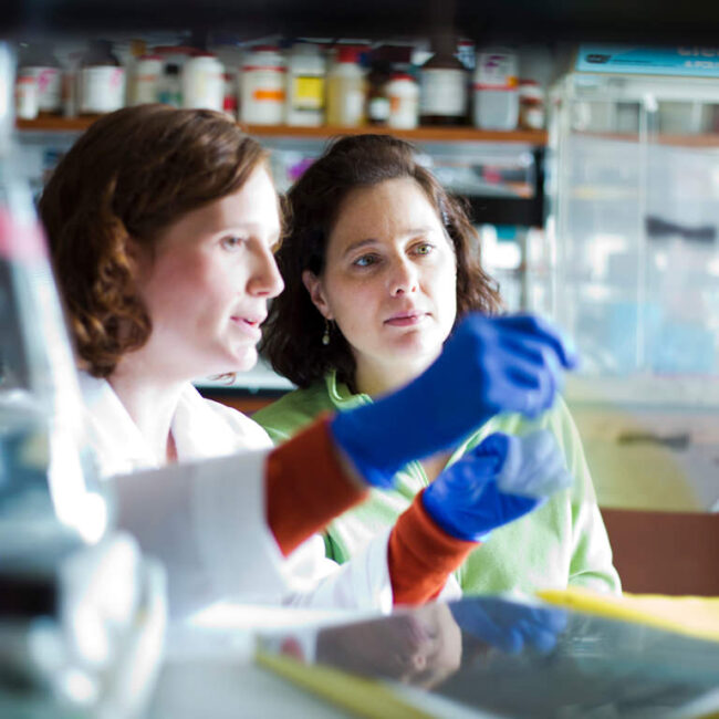 Two female scientists working at Emory