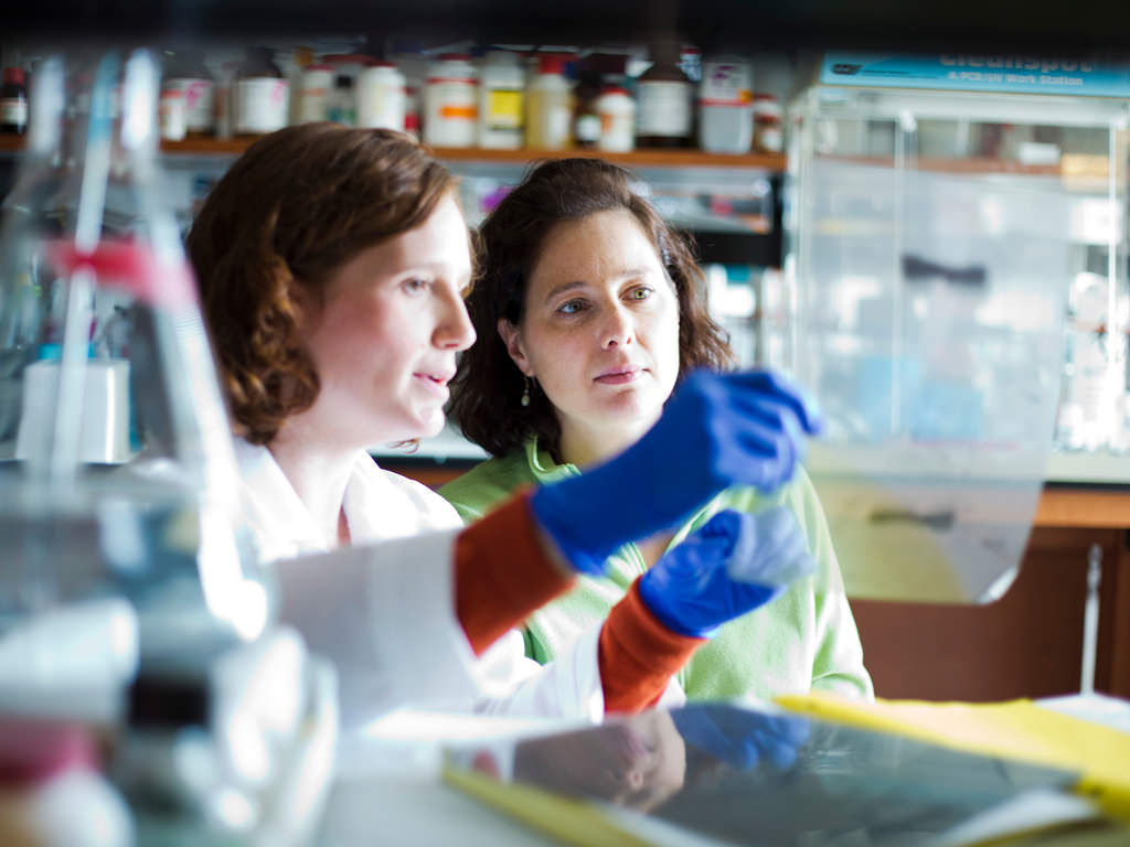 Two female scientists working at Emory