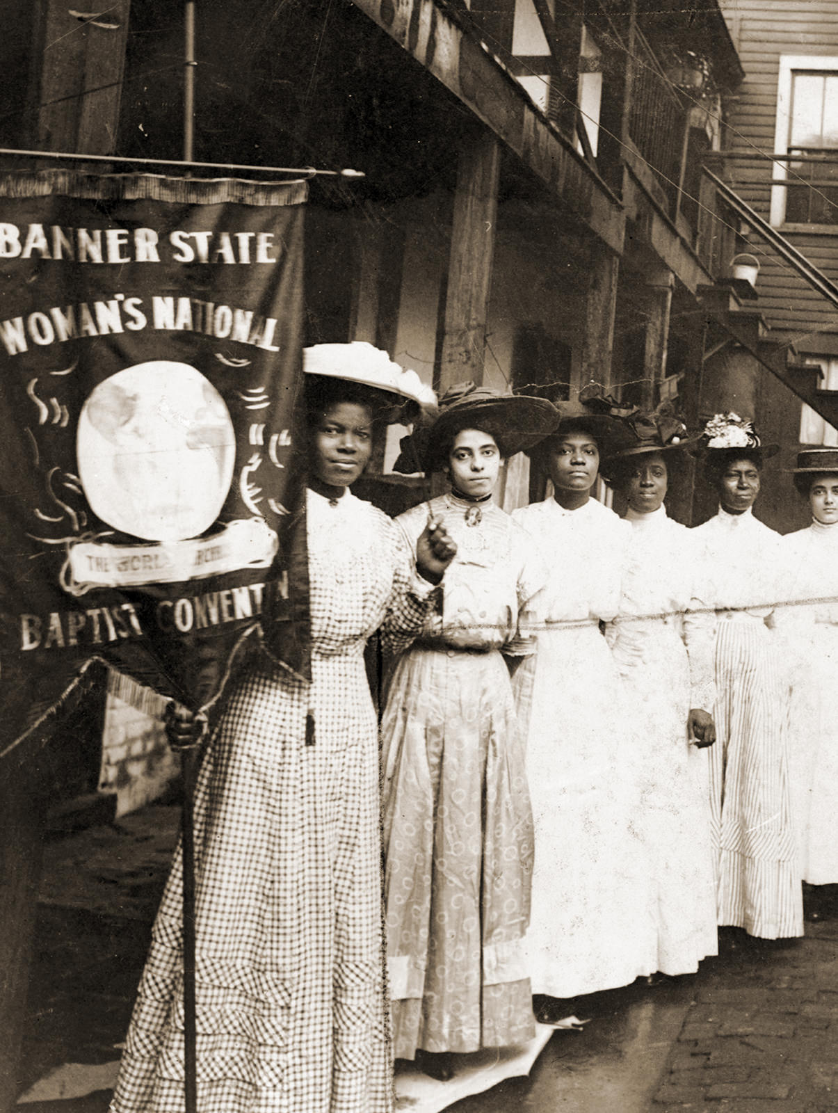 Black and white historical photo of suffragettes