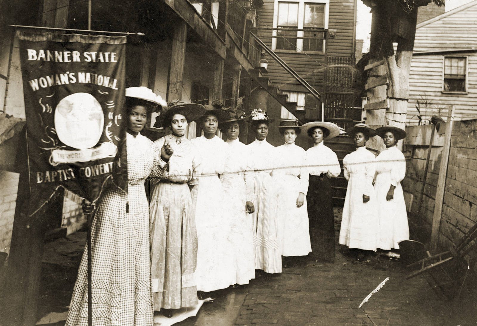 Black and white historical photo of suffragettes