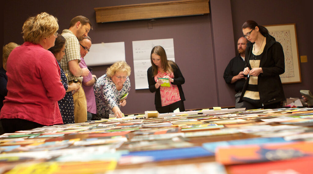 Men and women participating in a content strategy exercise