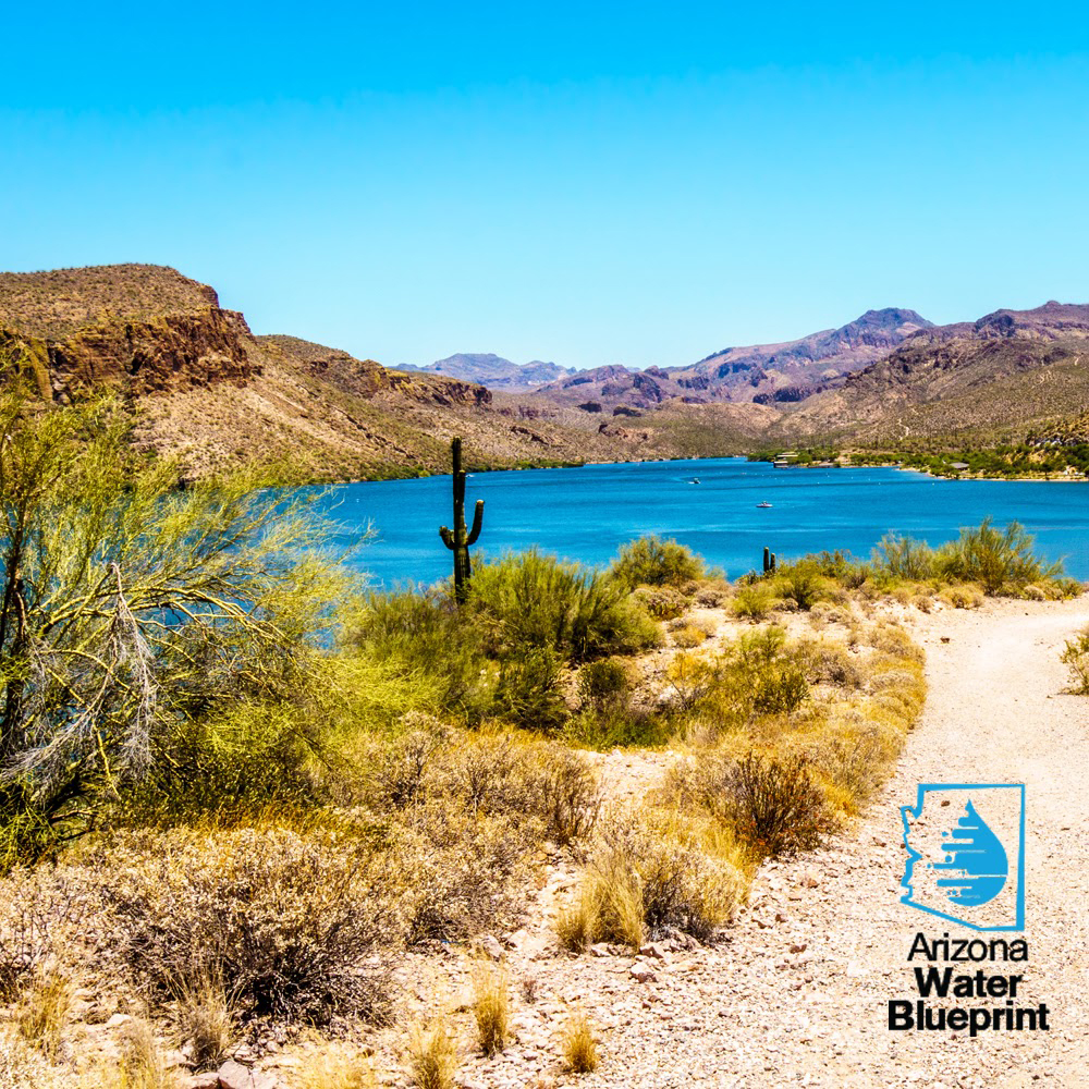 Photo of a lake in the desert with the Arizona Water Blueprint logo