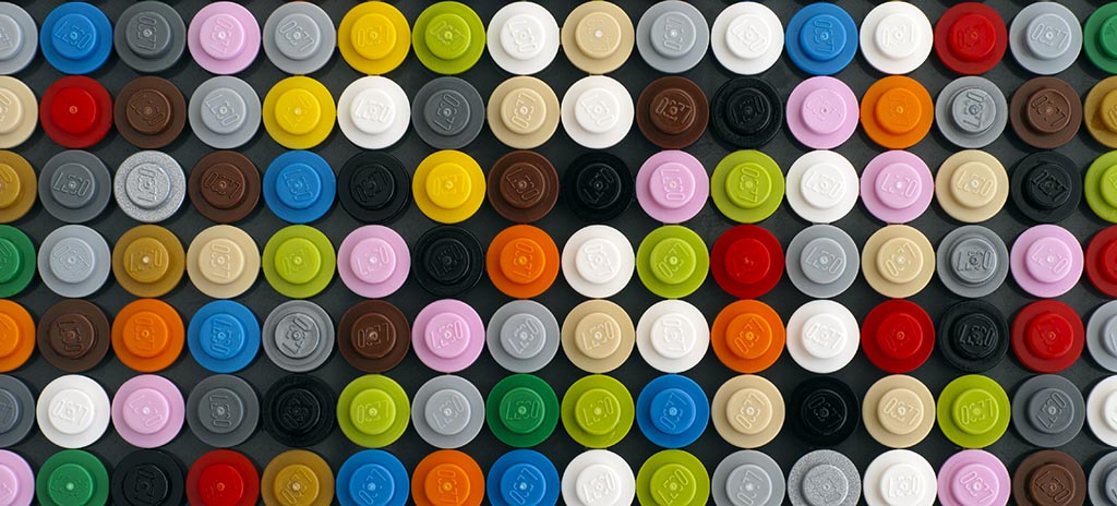 Lego round bricks arranged in a colorful pattern