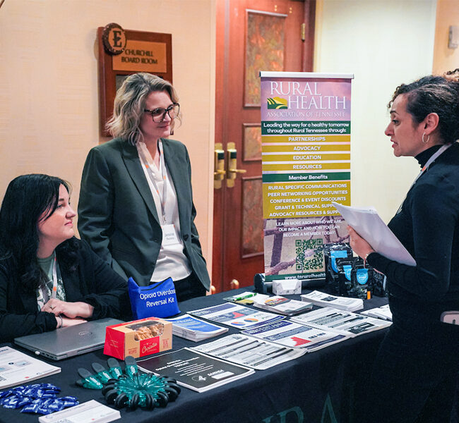 People talking at a Grand Challenges partner event